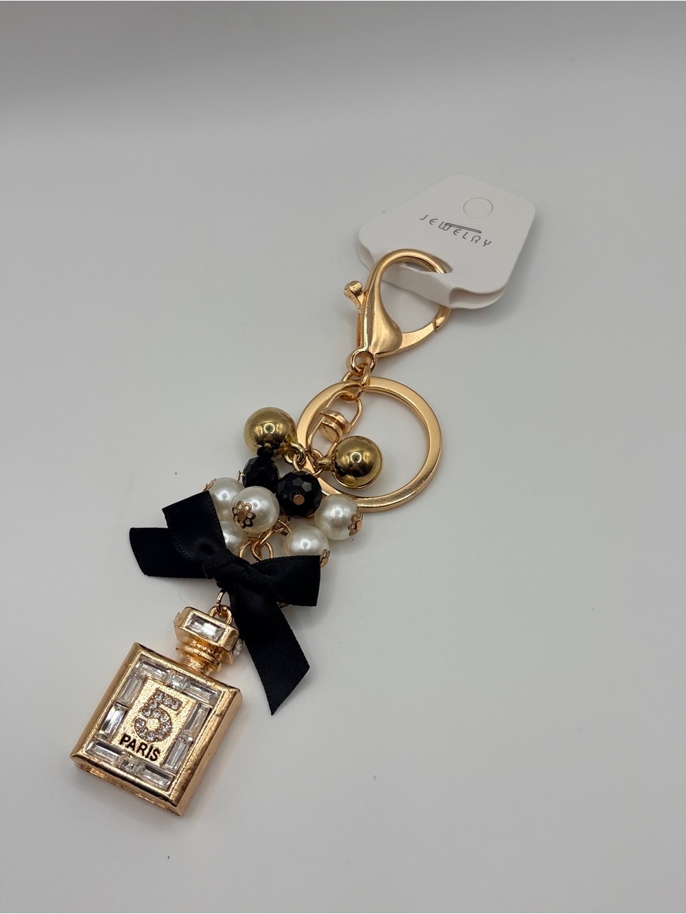 Gold Perfume Bottle Keychain with Black Bow and Pearls